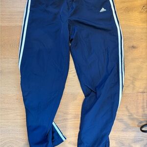Adidas Blue Sweatpants with Three-Stripe Design